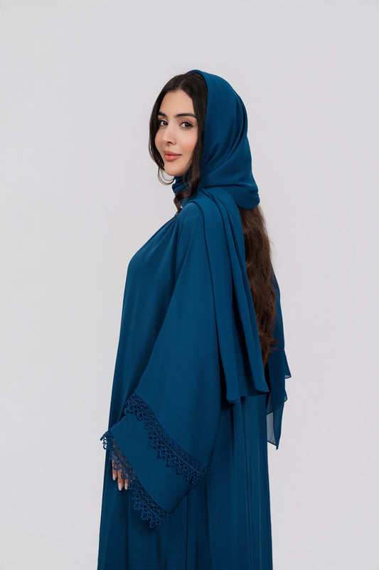 Peacock abayas with intricate lace details